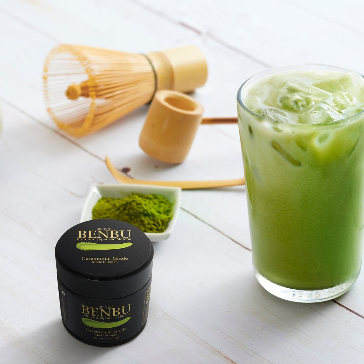 BENBU Ceremonial Grade Matcha 30g Tin with iced matcha latte, bamboo whisk and traditional matcha tools – premium Japanese matcha